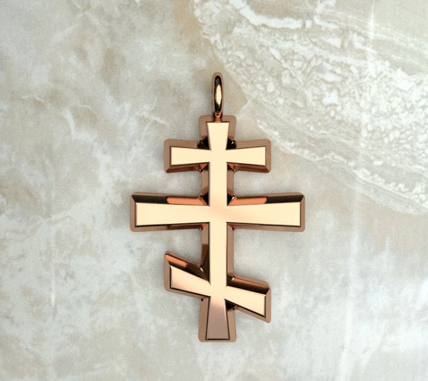 Rose gold or rose gold plated round beveled three bar orthodox cross.