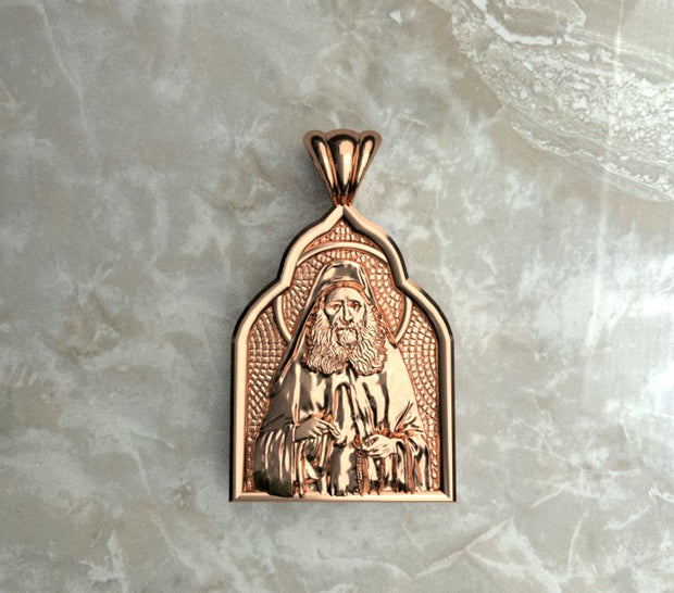 Saints of Christ Orthodox Icon Jewelry – Basilica (pointed Dome - Shaped) pendant of the Saint Joseph the Hesychast in rose gold or plated rose gold. (Front Side)