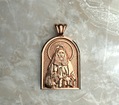 Saints of Christ Orthodox Icon Jewelry – Apse (Dome - Shaped) pendant of the Saint Joseph the Hesychast in rose gold or rose gold plated. (Front Side)