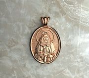 Saints of Christ Orthodox Icon Jewelry – Ovale (Oval - Shaped) pendant of the Saint Joseph the Hesychast in rose gold or plated rose gold. (Front Side)