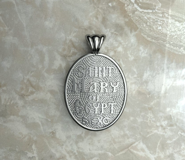 Saints of Christ Orthodox Icon Jewelry – Ovale (Oval- Shaped) pendant of the Saint Mary of Egypt in silver or white gold. (Back Side)