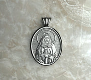 Saints of Christ Orthodox Icon Jewelry – Ovale (Oval - Shaped) pendant of the Saint Joseph the Hesychast in silver or white gold. (Front Side)