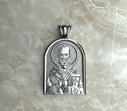Saints of Christ Orthodox Icon Jewelry – Apse (Dome - Shaped) pendant of the Saint Nicholas of Myra in silver or white gold. (Front Side)