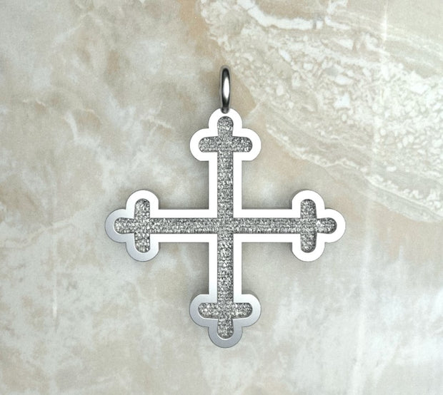 Sterling silver or white gold three budded Greek cross.