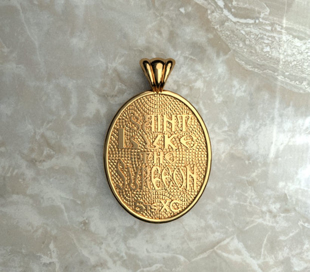 Saints of Christ Orthodox Icon Jewelry – Ovale (Oval - Shaped) pendant of the Saint Luke the Surgeon in yellow gold or plated yellow gold. (Back Side)