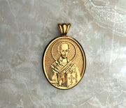 Saints of Christ Orthodox Icon Jewelry – Ovale (Oval- Shaped) pendant of the Saint John Chrysostom in yellow gold or yellow gold plated. (Front Side)