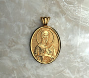 Saints of Christ Orthodox Icon Jewelry – Ovale (Oval- Shaped) pendant of the Saint Anthony the Great in yellow gold or plated yellow gold. (Front Side)