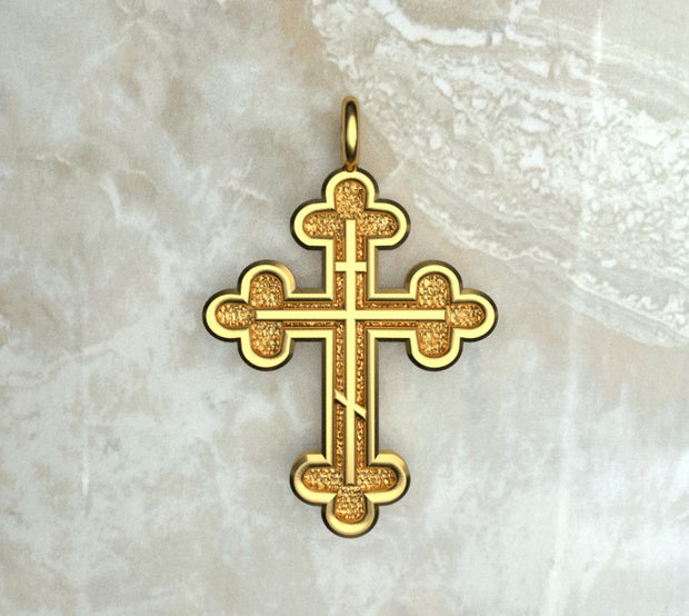 Yellow gold or yellow gold plated three budded cross with three bar inlay.