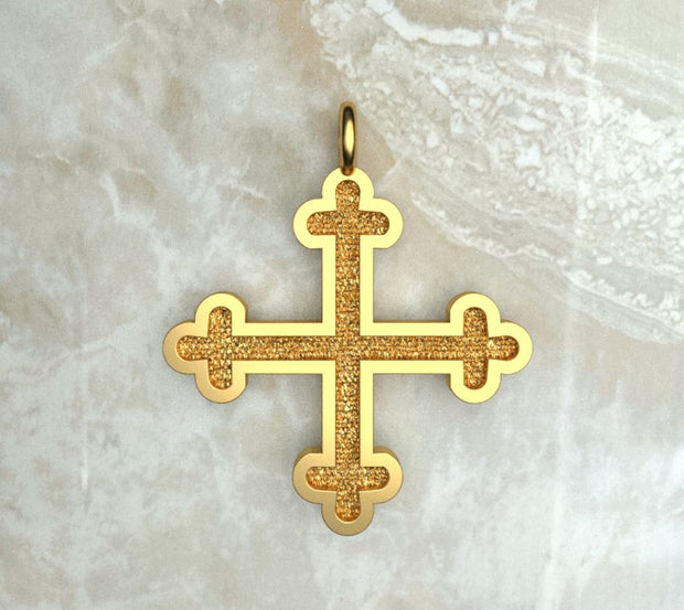 Yellow gold or yellow gold plated three budded Greek cross.